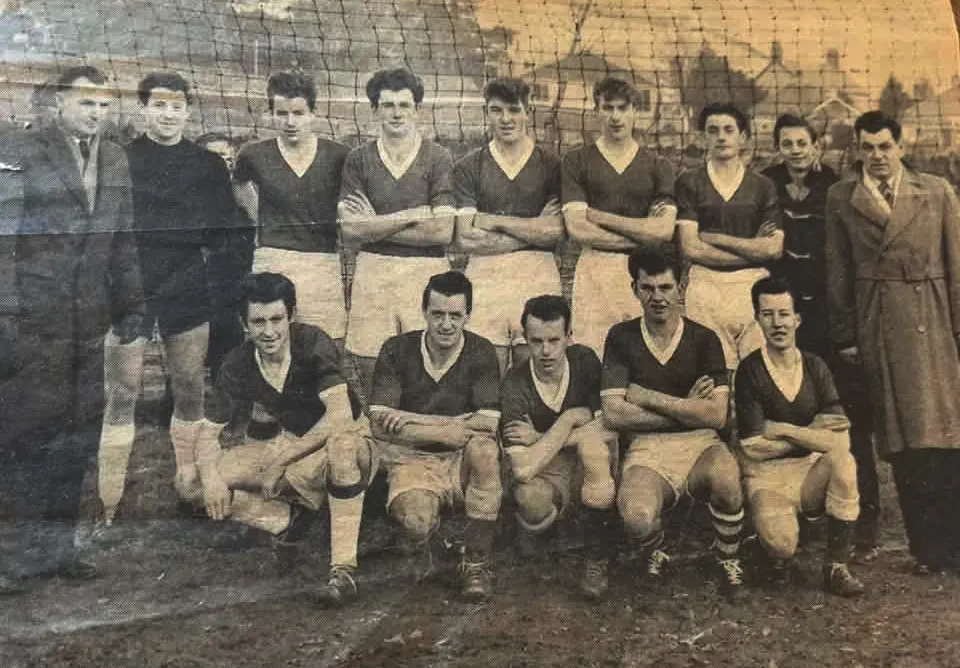 Llanfairfechan Town players celebrating a trophy win